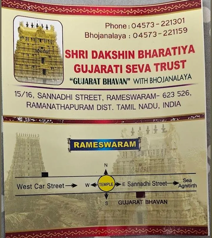 Official Gujarat Bhavan signboard with address and temple route